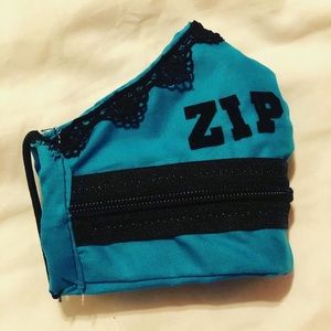 Aqua and black zip the lips face mask